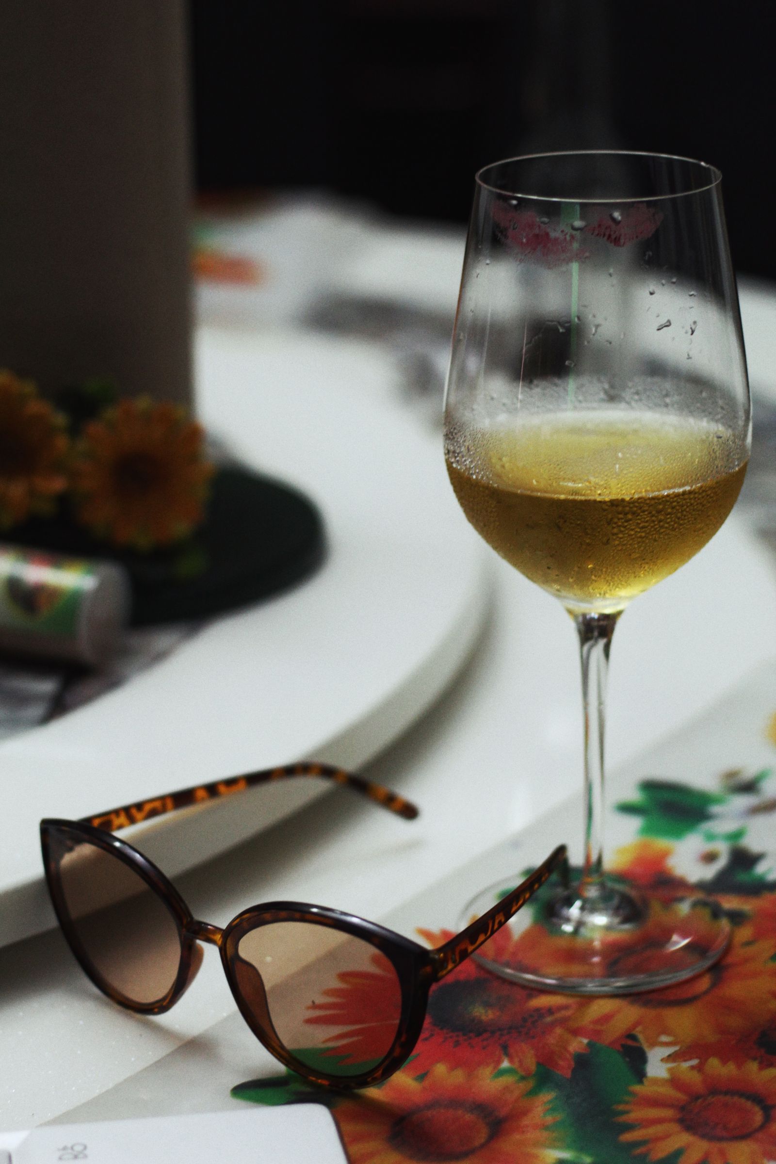 A glass of chilled Pinot Grigio on a sunny table